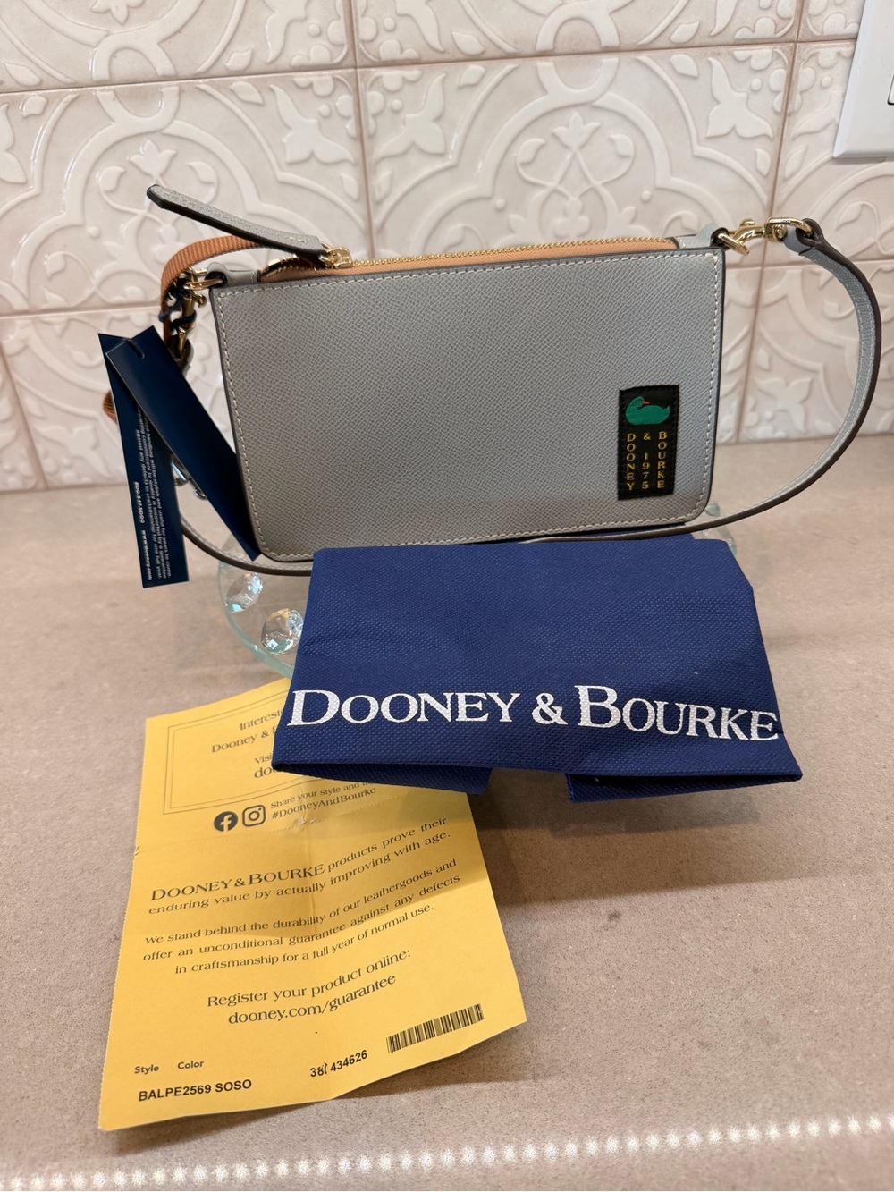 Dooney and Bourke stone colored shoulder bag - style Alpine Janine NWT